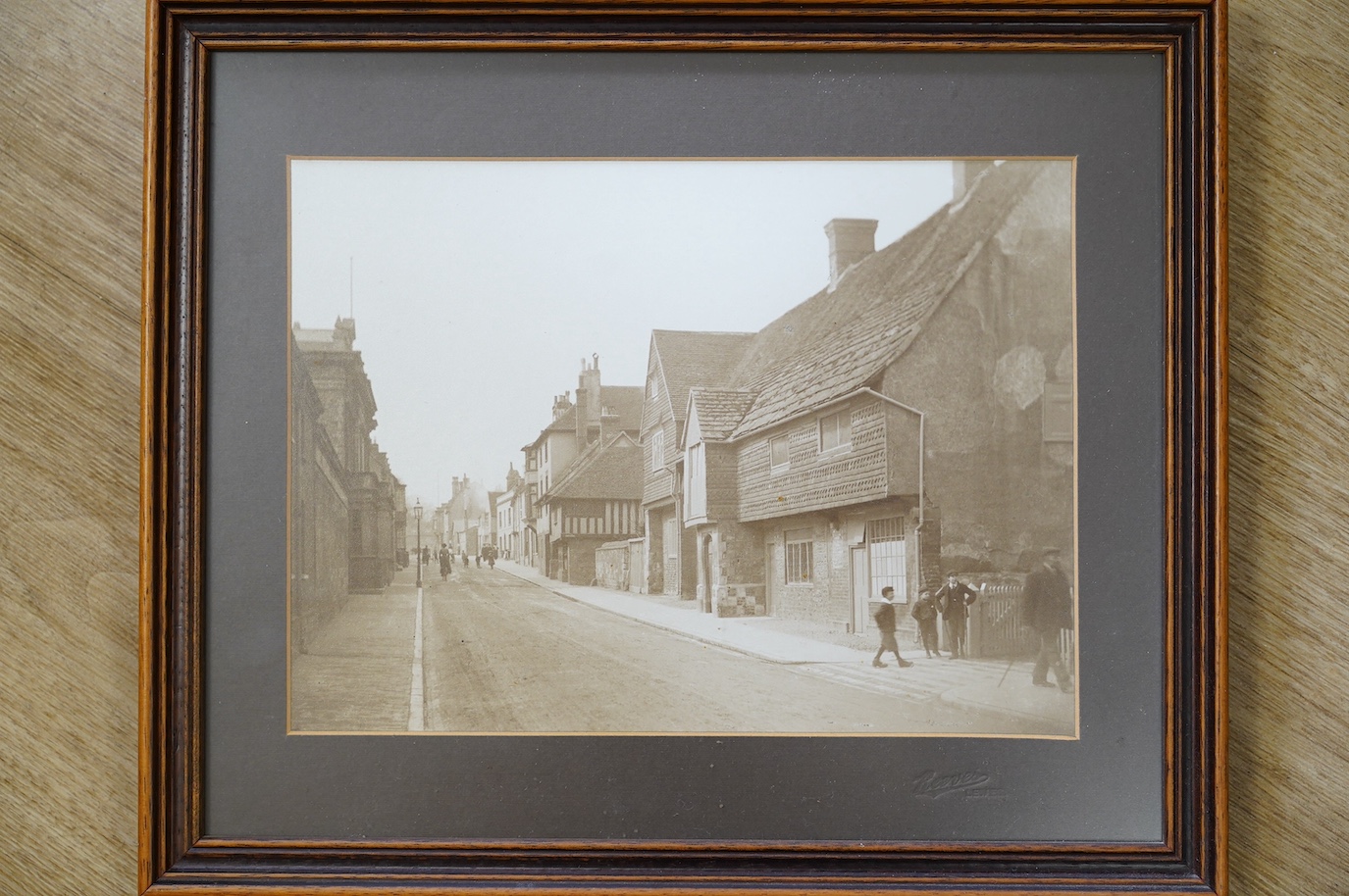 A collection of various prints including coastal etchings and local Lewes prints and black and white photographs. Condition - varies, mostly fair